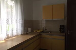 Căsuța la Poalele Dealului